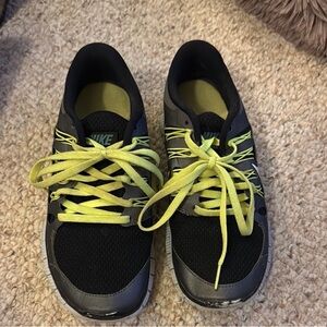 Nike Black and Yellow Sneakers well loved